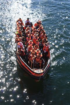 Boat returning to the ship