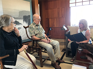 Geraldine Richmond reads the award letter to Gordon and Betty Moore Geraldine Richmond reads the award letter to Gordon and Betty Moore
